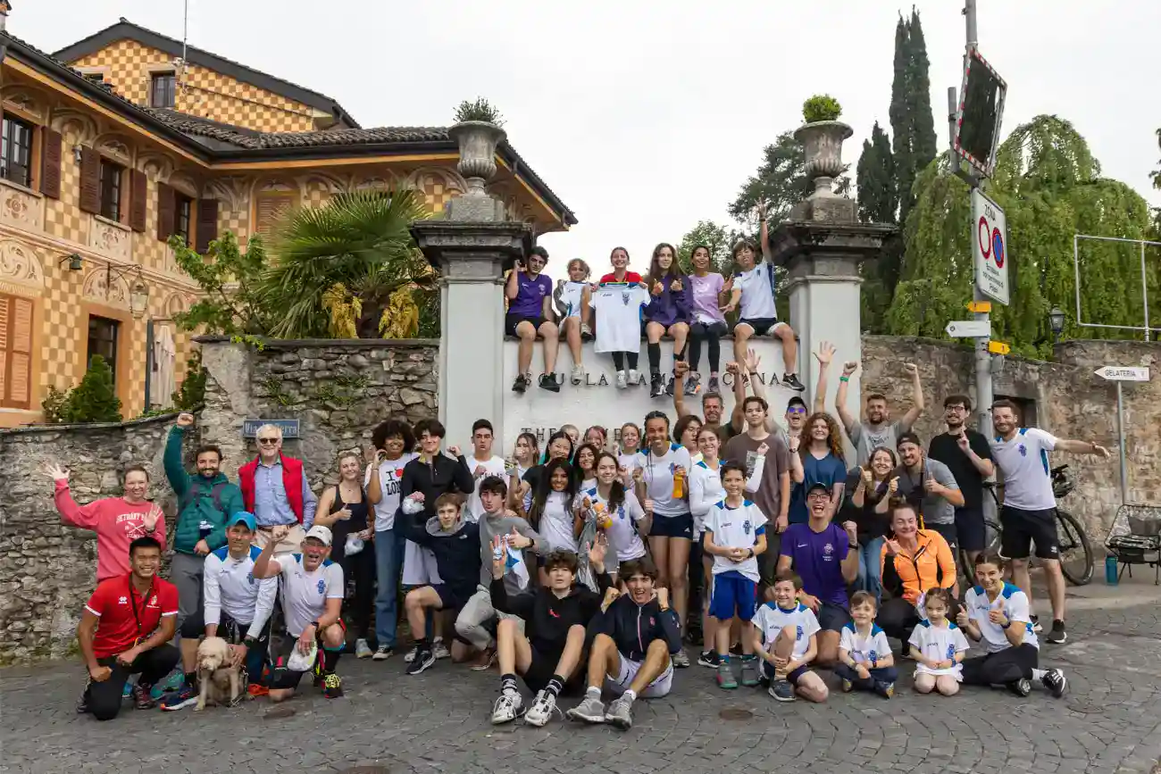 This Year at TASIS: 2023 12 Student group at a historic European school campus, diverse children enjoying educational trip, world schools international education, community bonding.
