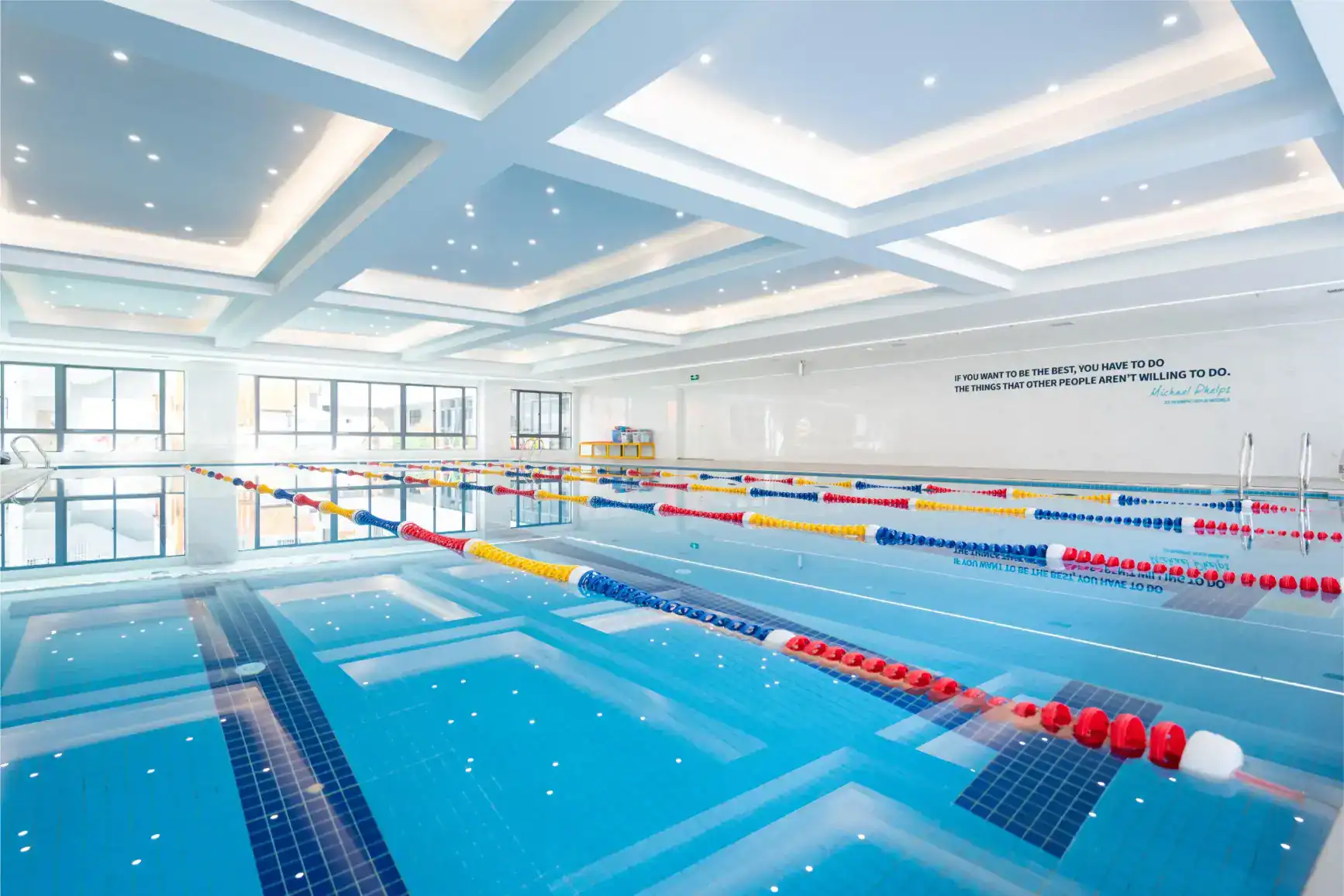 Spacious indoor swimming pool at a prestigious international school for optimal student fitness.