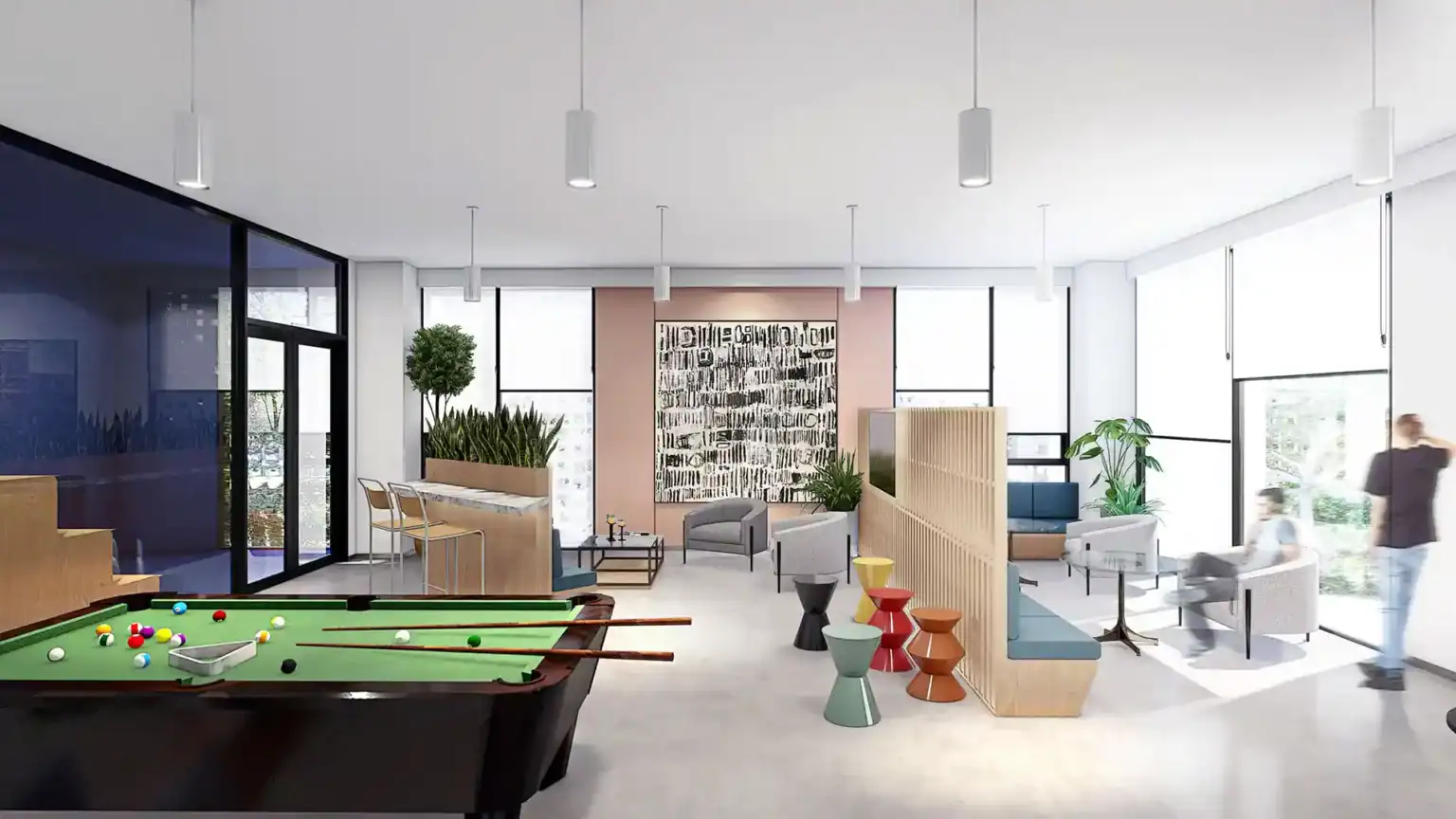 Bright, modern student lounge with billiards, comfortable seating, large windows, and vibrant decor in a top World Schools environment.