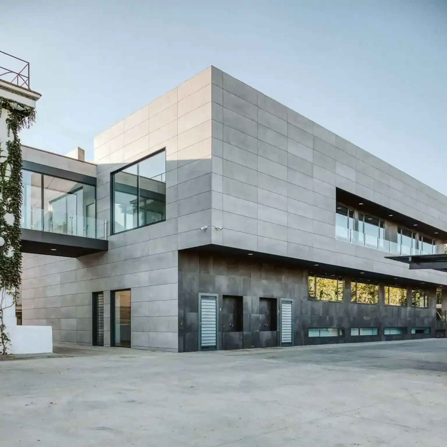 Modern international school building with contemporary architecture and large glass windows.