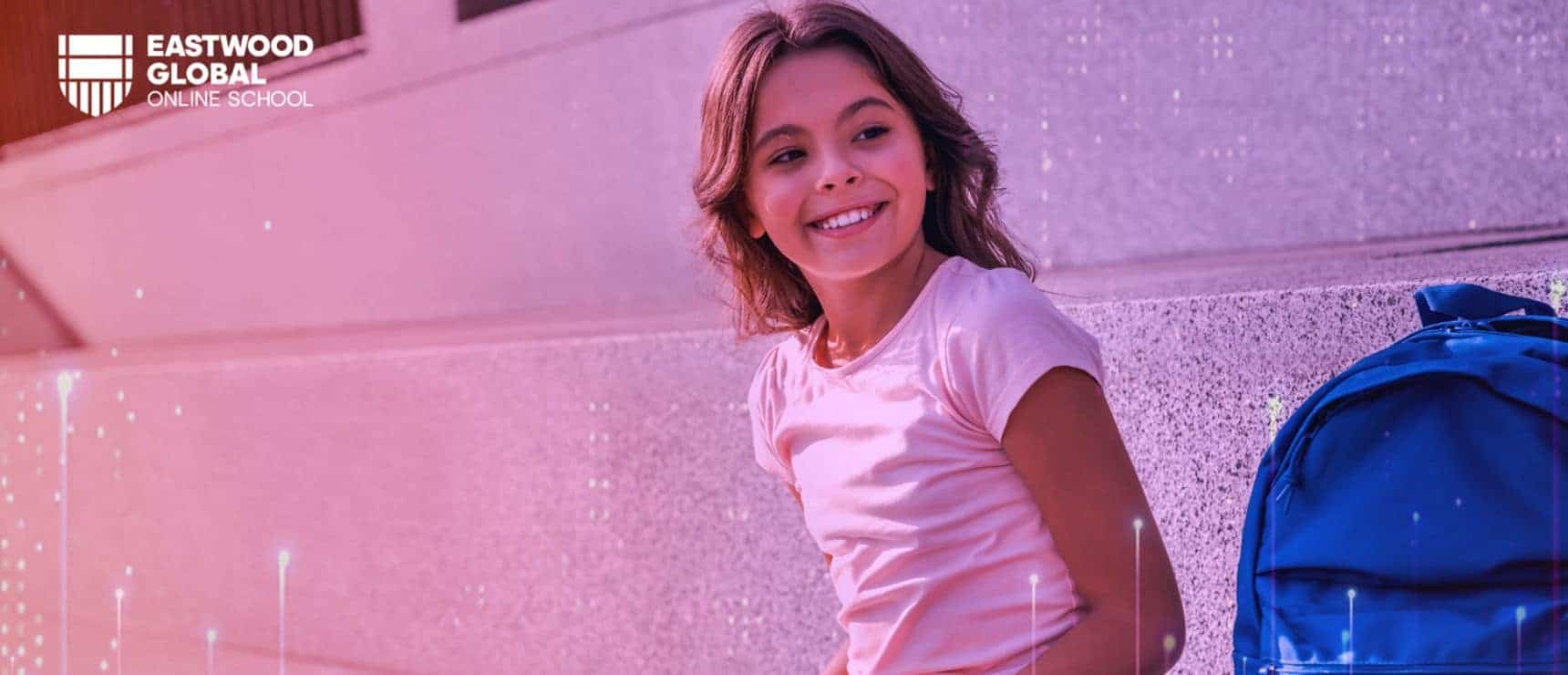 Bright young girl smiling outside Eastwood Global Online School with backpack, emphasizing quality international education.