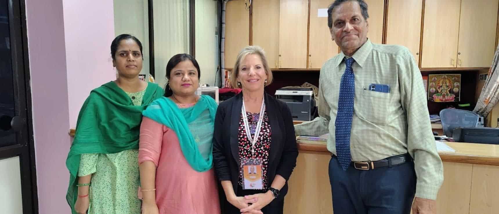 Inclusive diverse school staff teamwork education excellence in a welcoming environment.