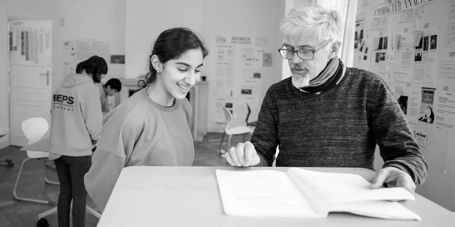 Focused teaching moment at a world-class international school with engaged teachers and students.