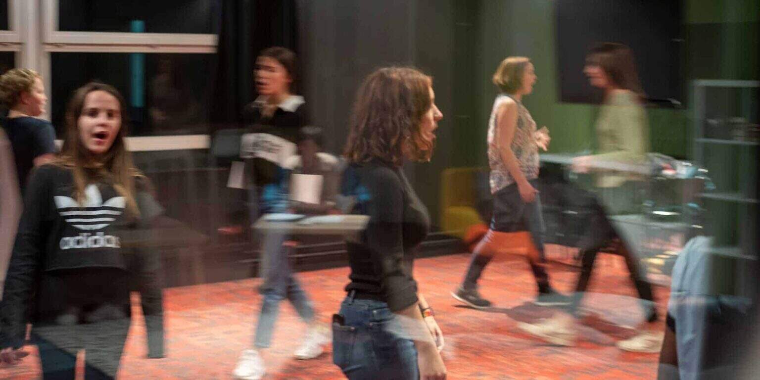 Children engaged in activities at a modern international school, showcasing a dynamic learning environment.