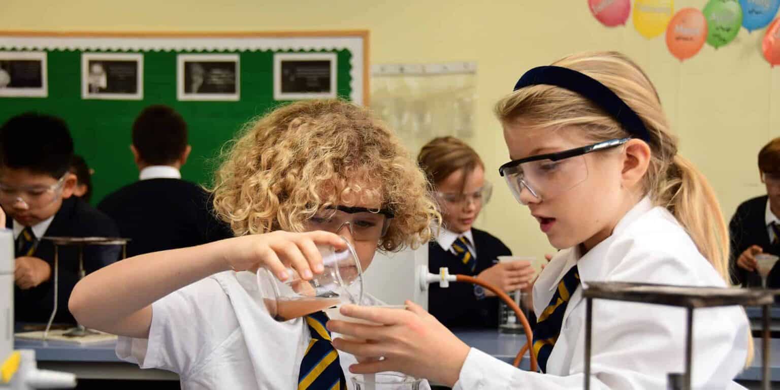 Innovative school science experiment with students working together in classroom setting.