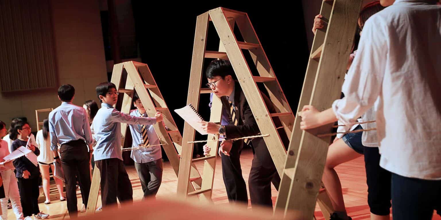 Innovative school STEM activity with students building and exploring educational structures.