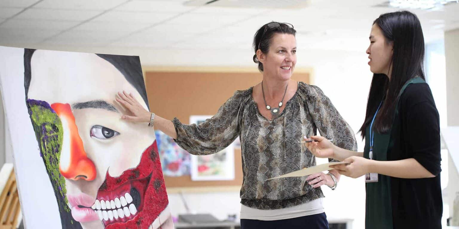 Vibrant art discussion at a global school art event, showcasing creativity and cultural diversity.