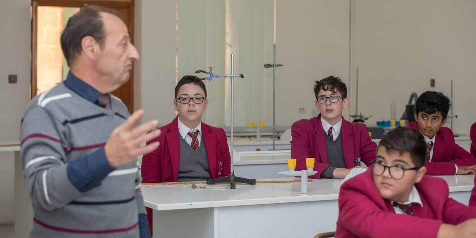 Bright students engaged in science class at World Schools, a leading international school network.