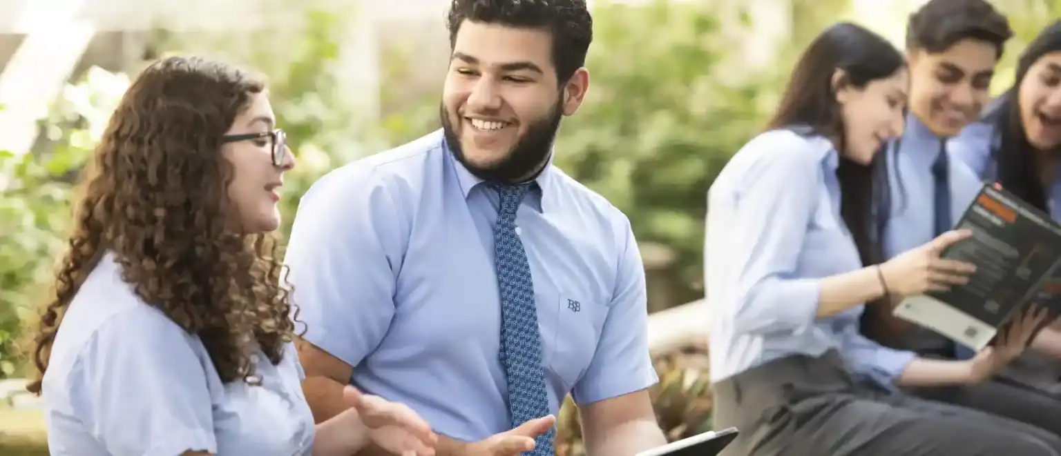 Diverse students engaging outdoors at World Schools, promoting global education excellence.