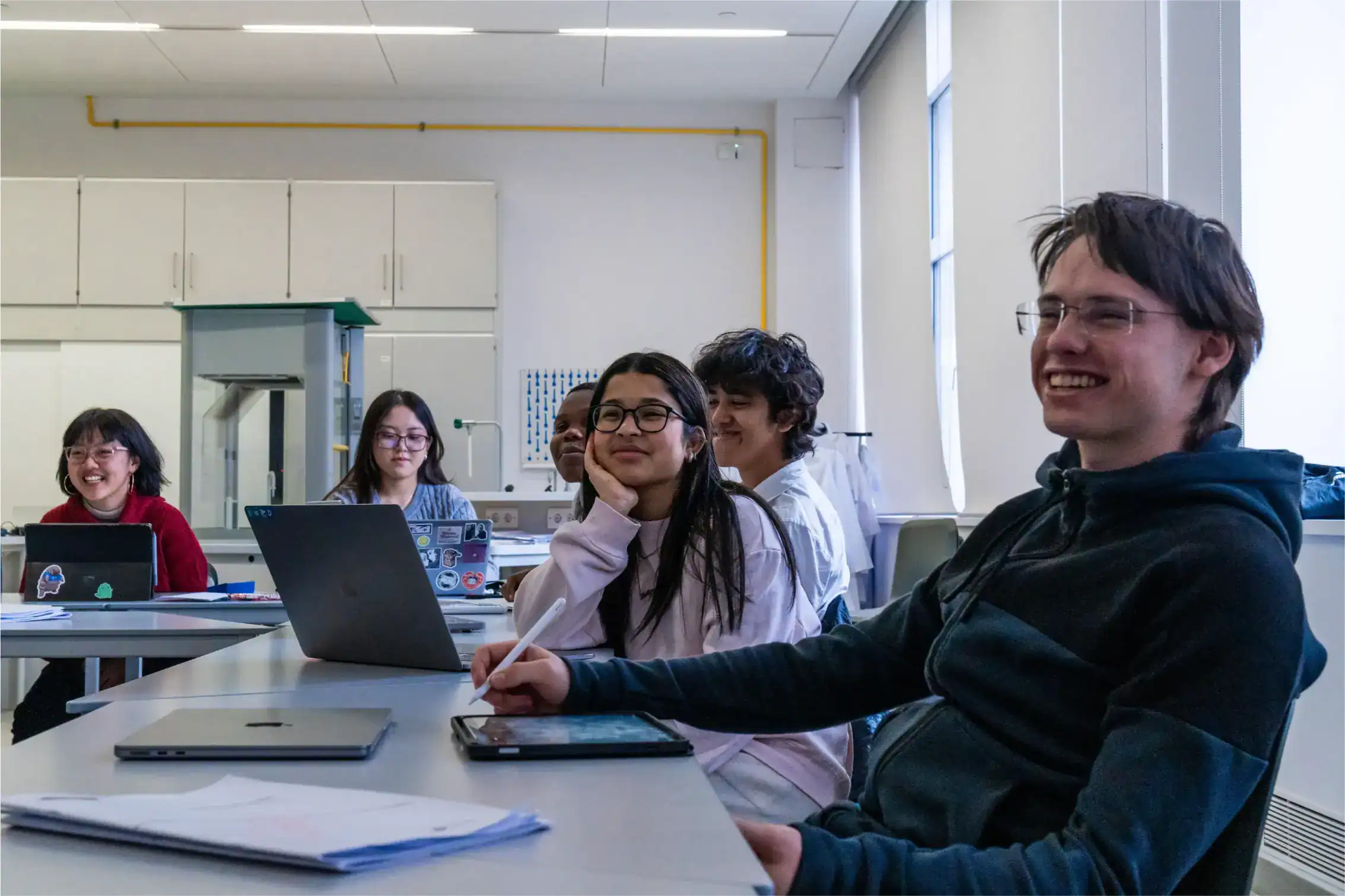 Diverse students engaging in a classroom at world-class international school for optimal learning.
