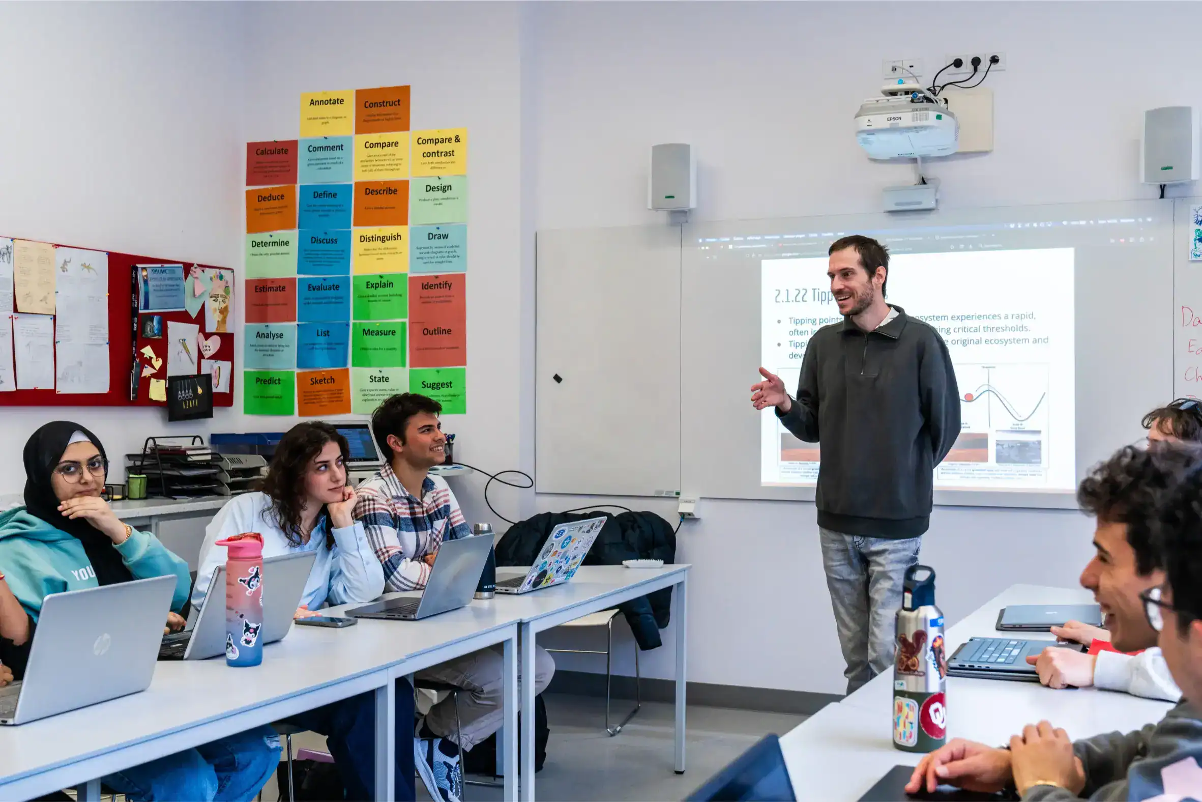 Innovative classroom at a World Schools international education center with diverse students and engaging teaching.