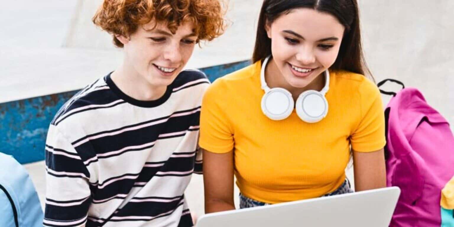 Young students engaging with online learning at a World Schools program.