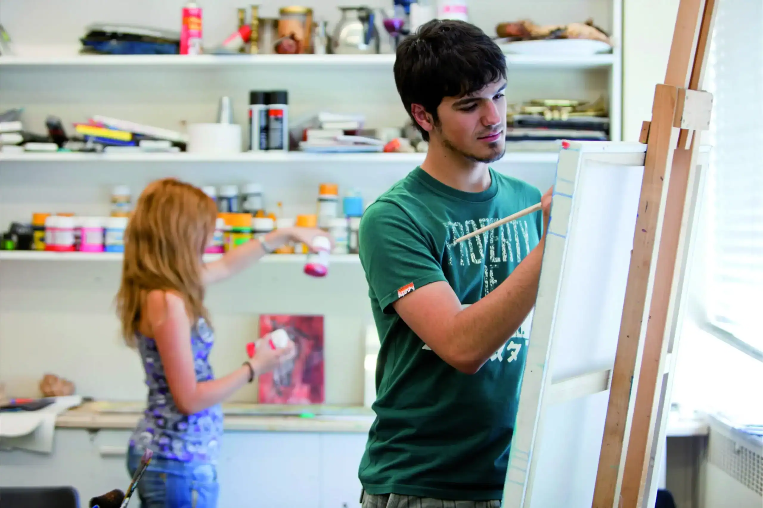 High school students engaging in art class at World Schools, fostering creativity and artistic skills.