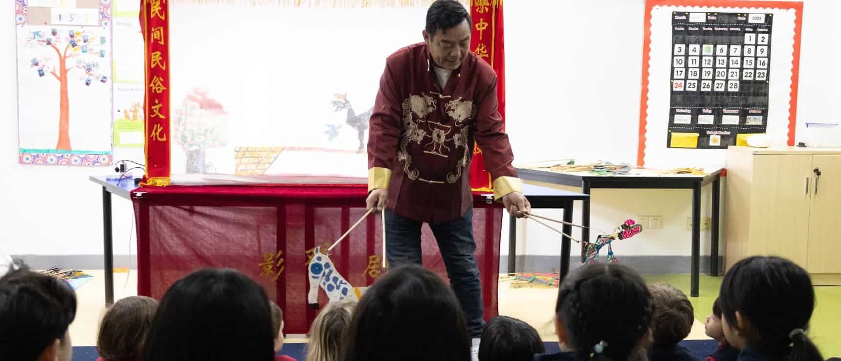 Colorful puppet show in a multicultural classroom at World Schools.