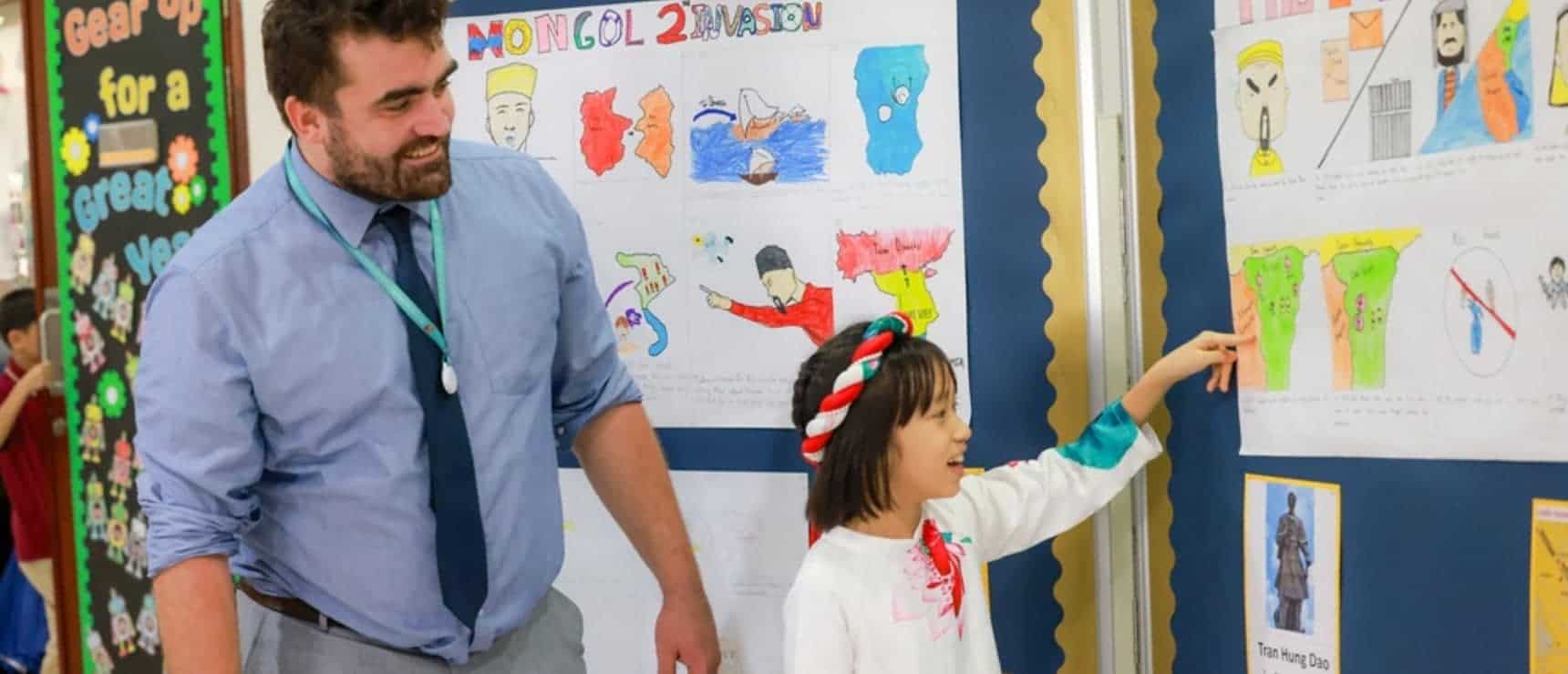Children learning about Mongolia at World Schools educational program, engaging classroom activity.