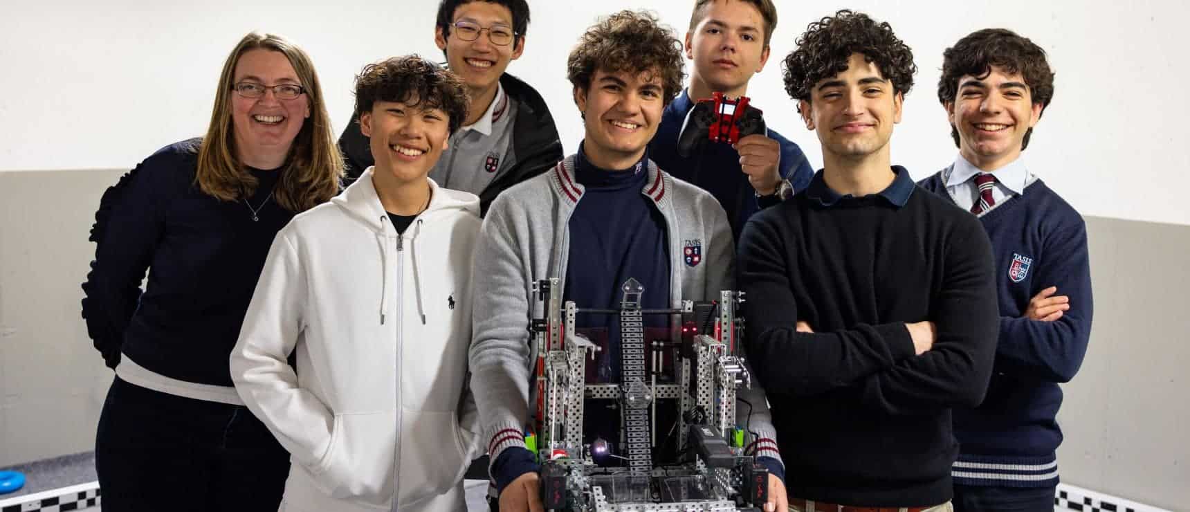 Innovative students working on robotics project at top international school.