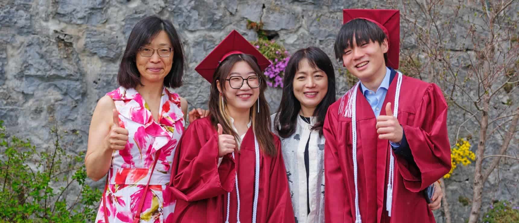 Bright and happy students celebrating graduation at World Schools, embracing educational achievement and success.