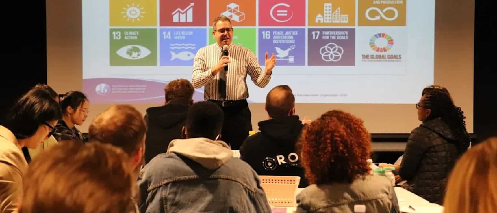 Global educator presenting at World Schools conference on Sustainable Development Goals (SDGs).