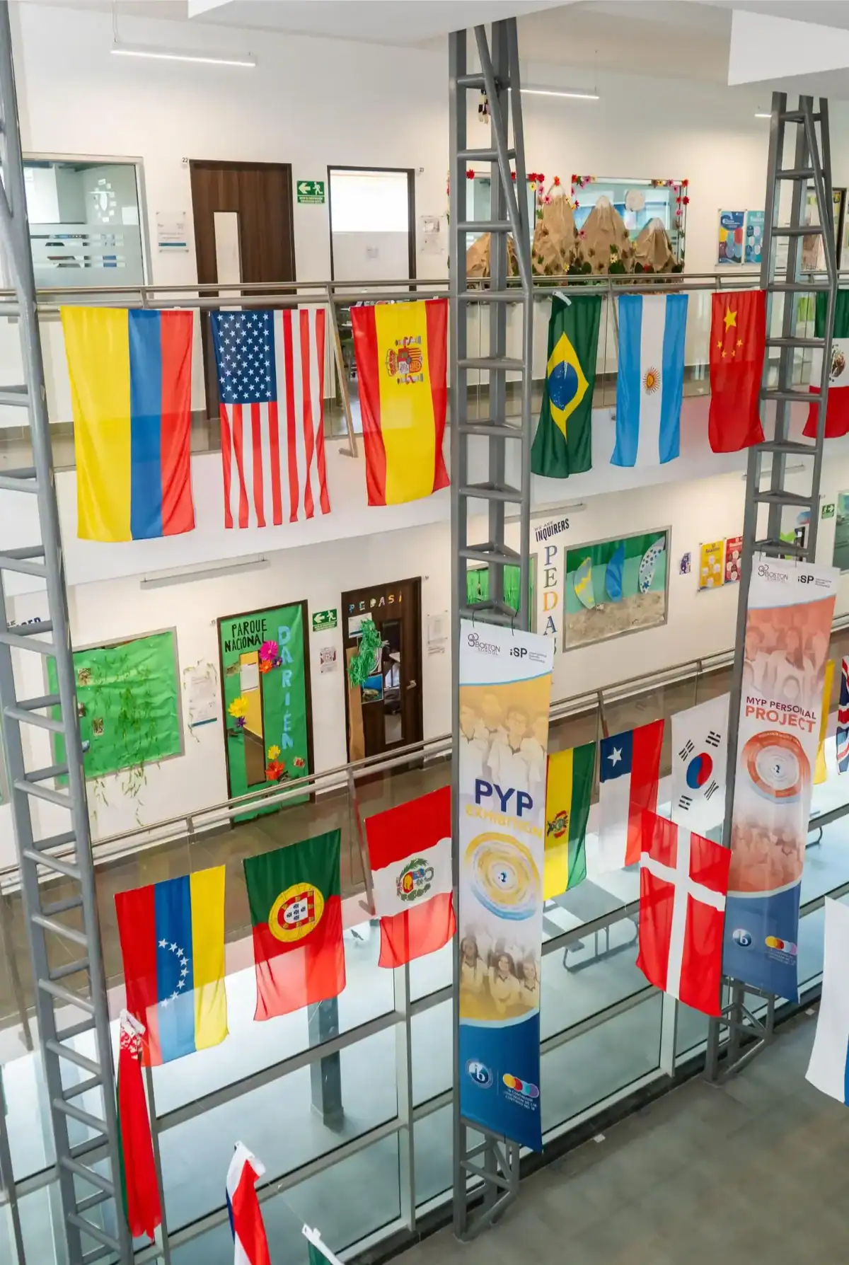 International flags representing diverse countries at Boston School International.