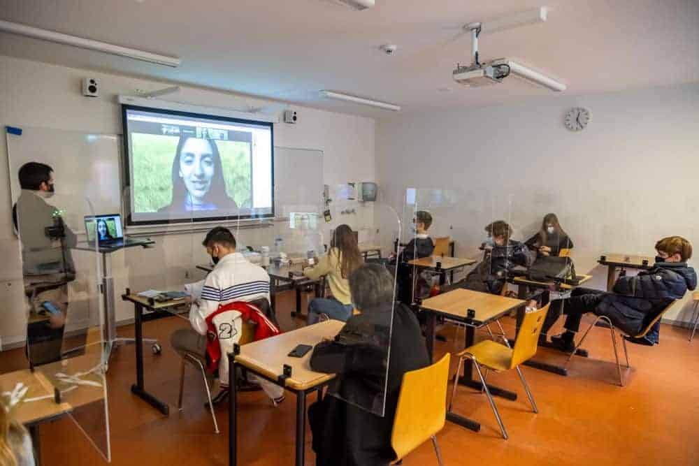 Students attending a virtual classroom session at a World Schools educational institution.