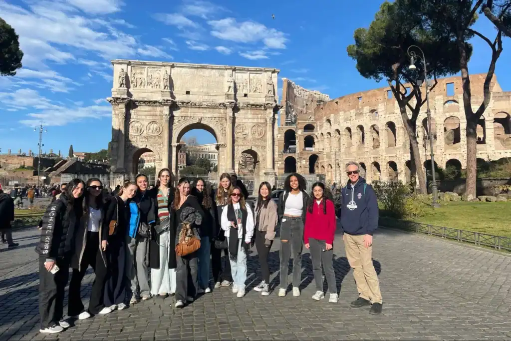 Arc de Triomphe and Roman Colosseum with students on a cultural school trip, showcasing international education and travel experiences.
