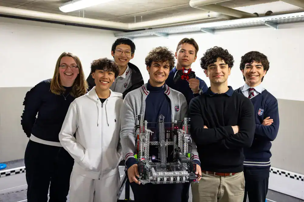 This Month at TASIS: March 2025 1 Innovative students building robotics projects at a World Schools STEM event.