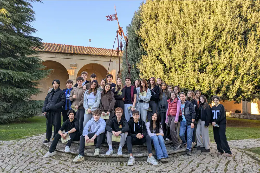 This Month at TASIS: March 2025 6 1. Diverse group of students at a private World School campus in the late afternoon.