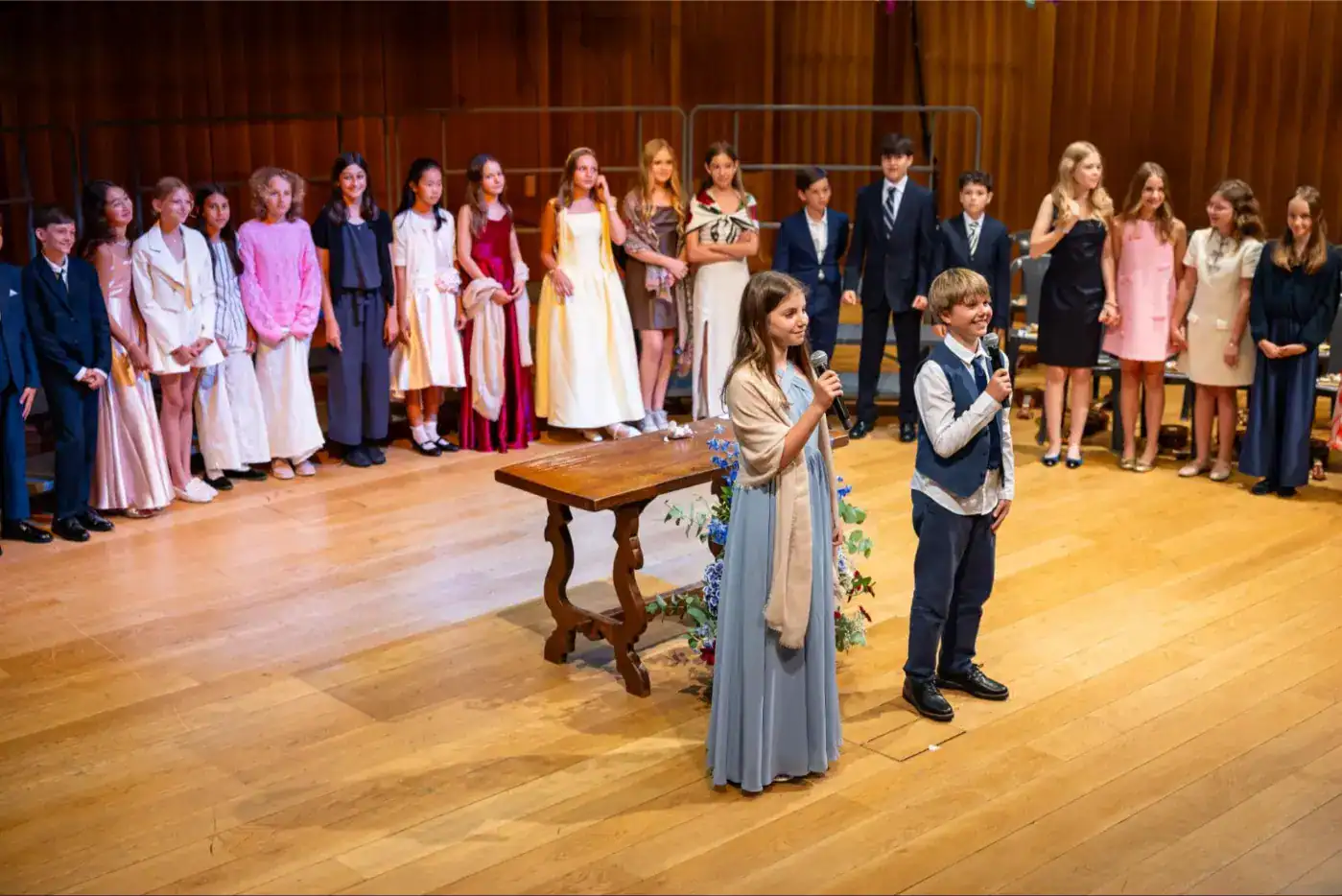 This Month at TASIS: June 2025 8 Bright students participate in a formal school event at a prestigious World Schools educational program.