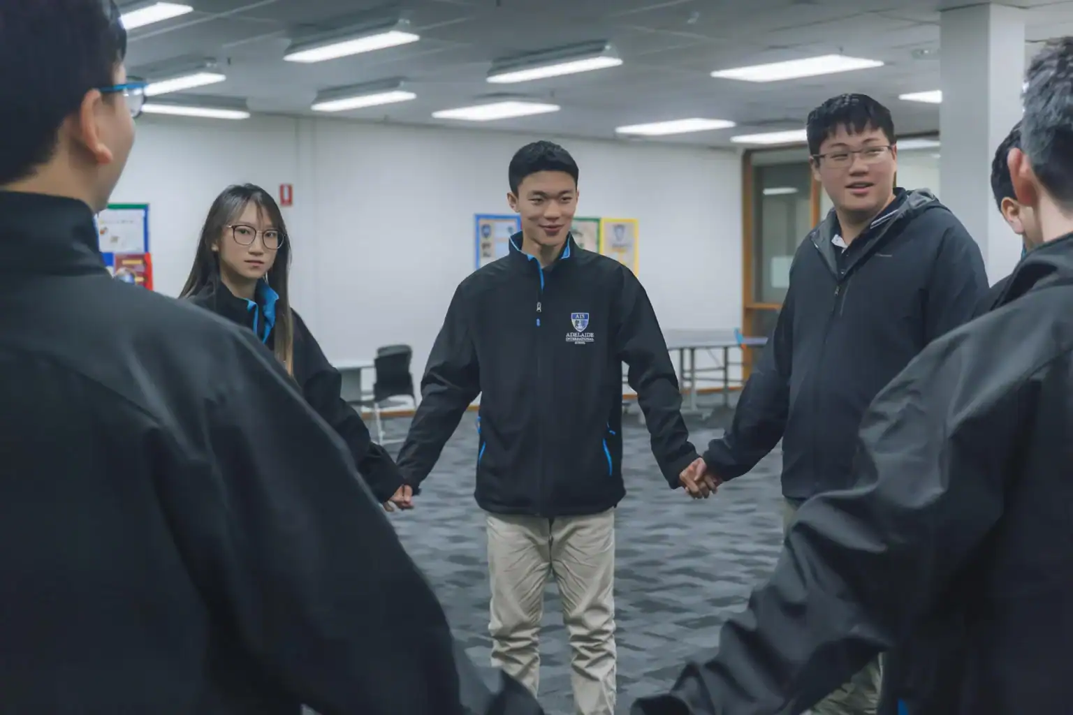 Students in a confident team-building activity at World Schools International.