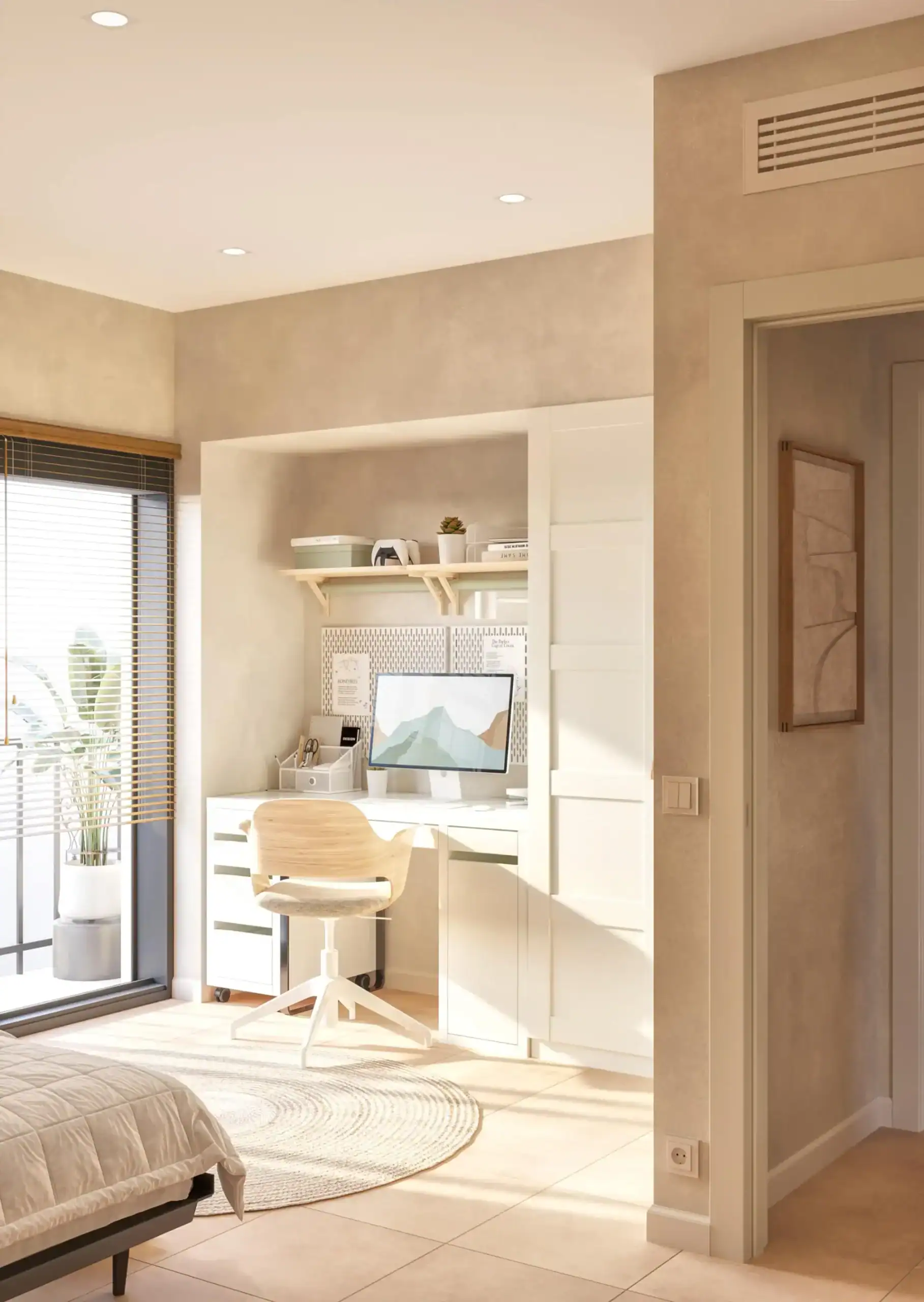 Modern study nook with white desk and computer, bright natural light, cozy home office atmosphere.