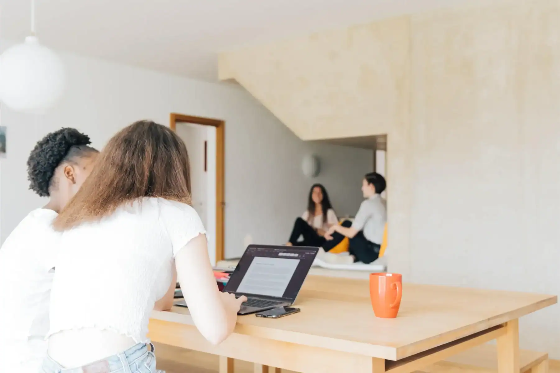 Engaging students in cooperative learning at a modern international school.