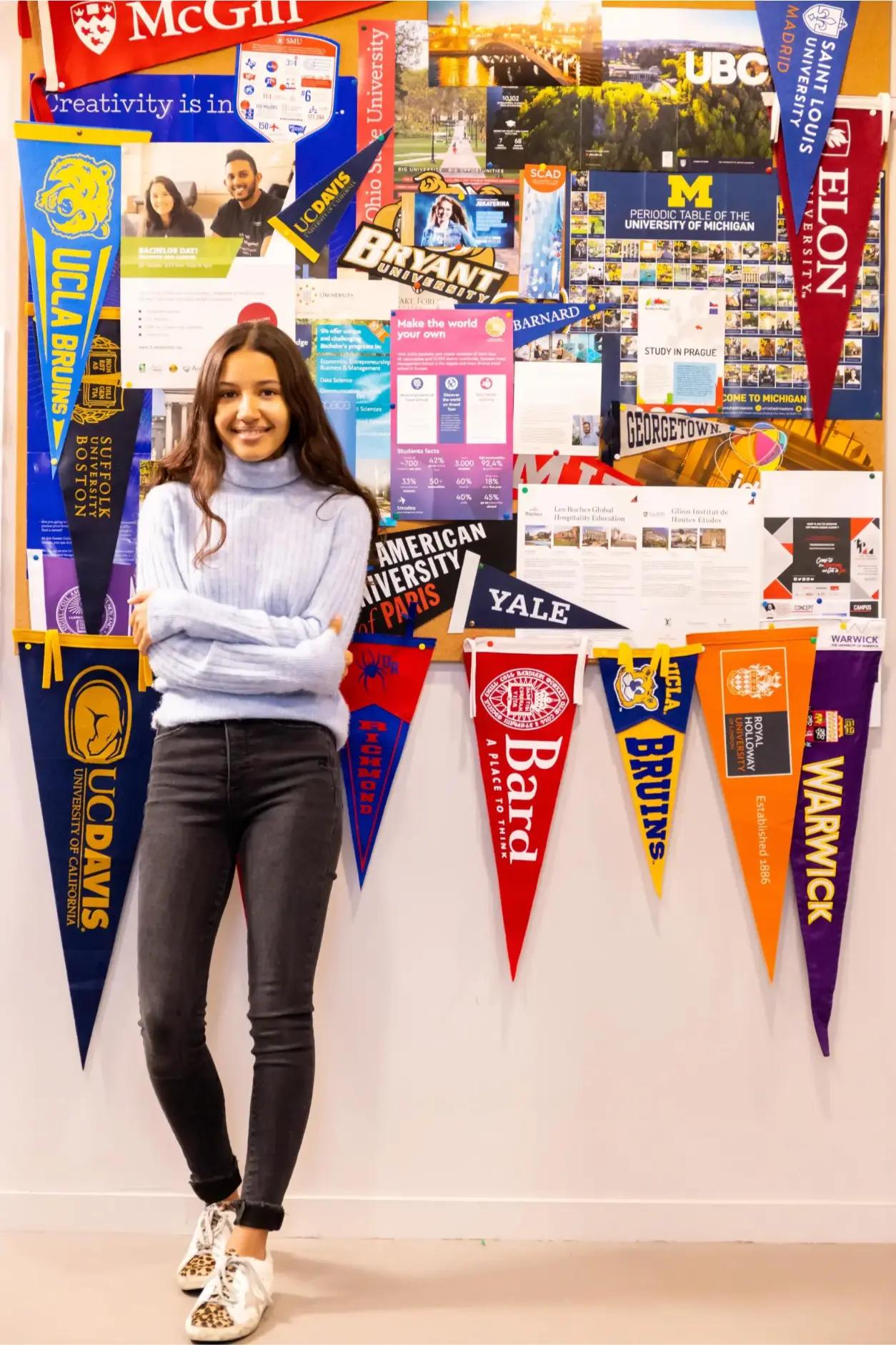 U.S. college flags at an international student event, showcasing global educational opportunities in top world schools.