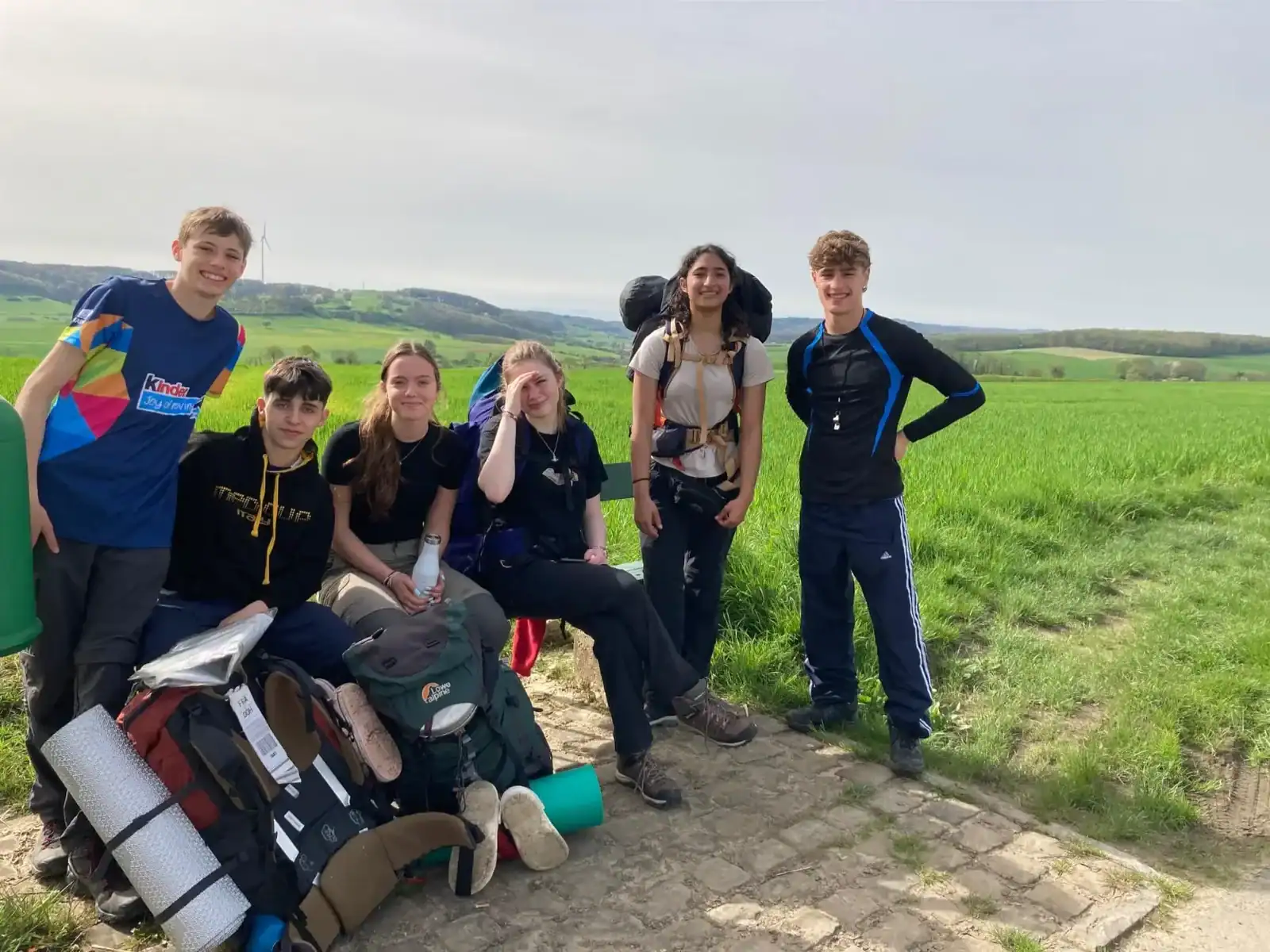 School students enjoying outdoor activities during a field trip in Luxembourg.
