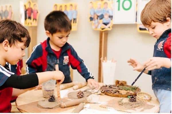 Children engaging in creative arts and crafts at Dulwich College Bangkok.