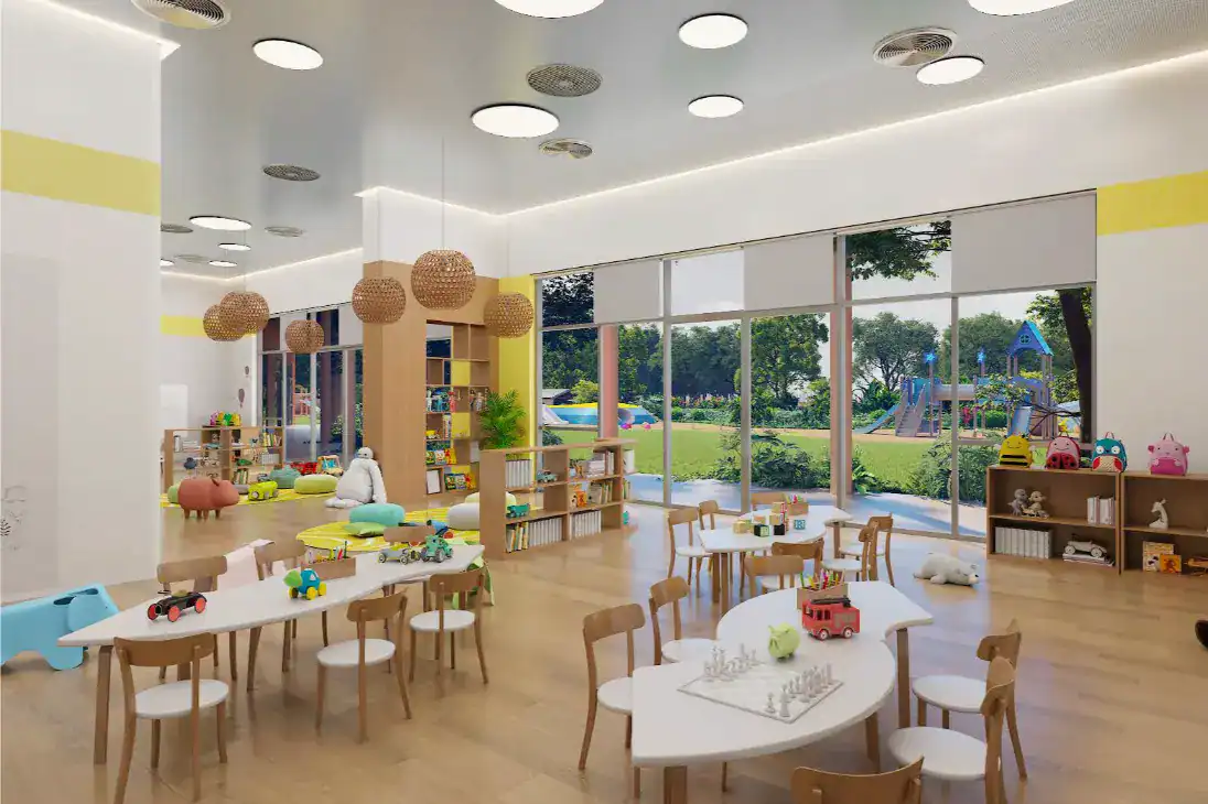 Bright indoor preschool classroom at Dulwich College Bangkok with toys and large windows.