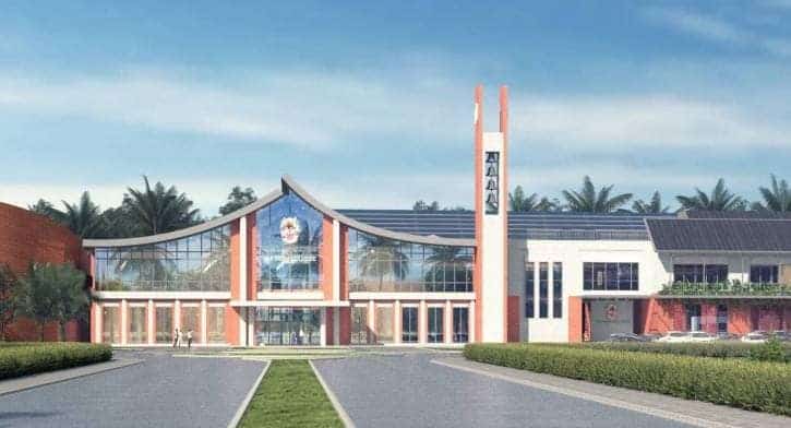 Modern Dulwich College Bangkok campus with glass facade and lush surroundings.