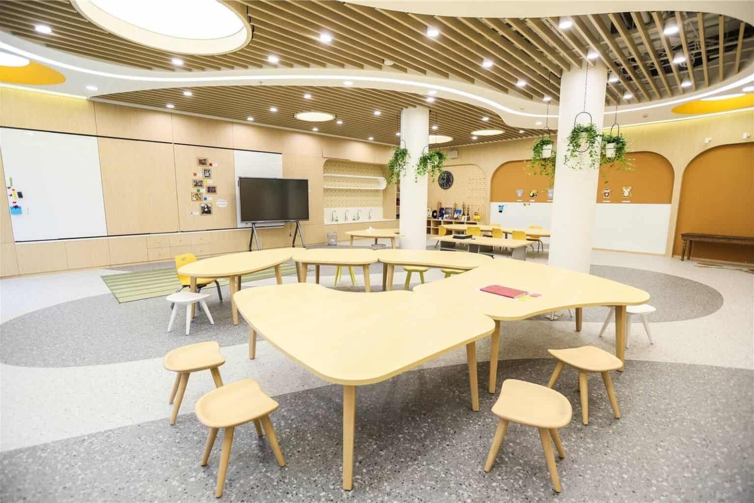 Bright, spacious learning environment with contemporary furniture and technology.