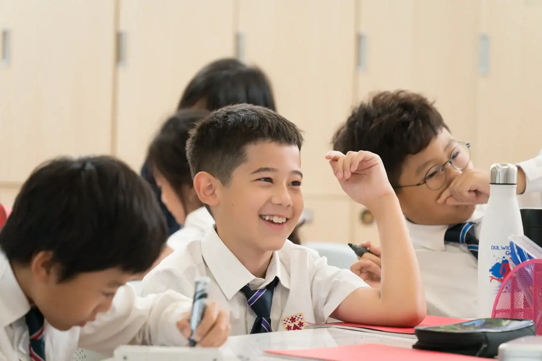 Dulwich College Suzhou students engaging in a science lesson.