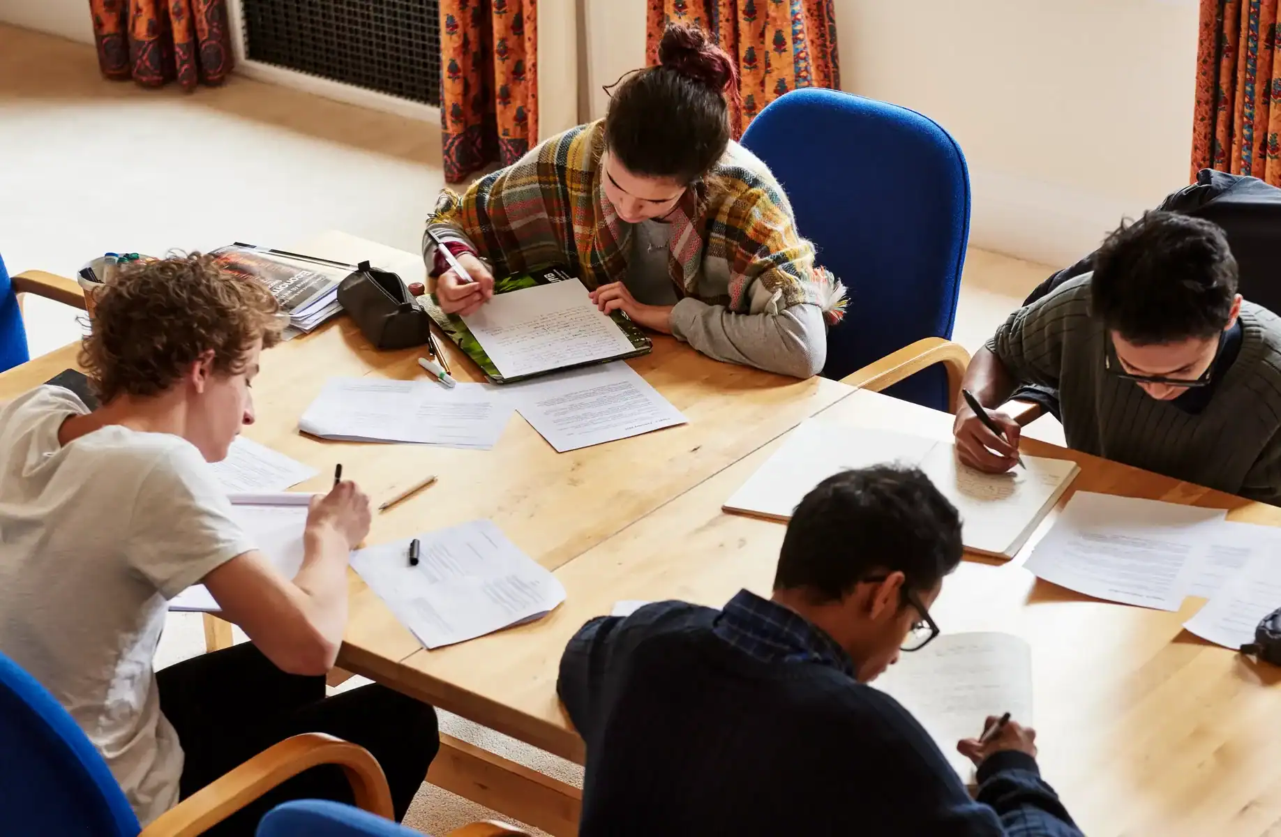 Educational students collaborating at Brockwood Park School.