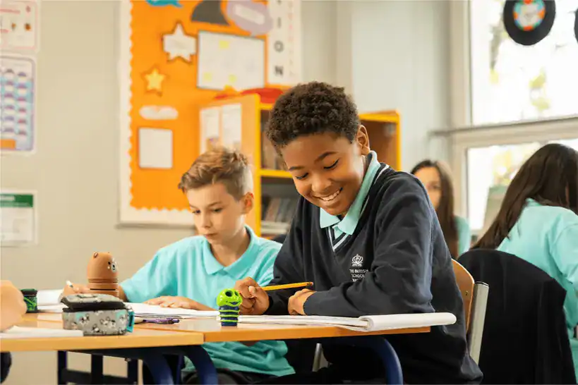Young students engaged in classroom activities at The British School Warsaw.