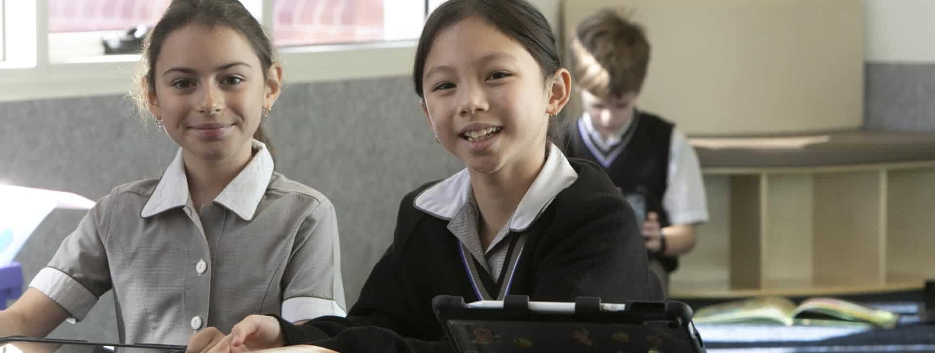 Students in classroom at Ivanhoe Grammar School engaging in learning activities.