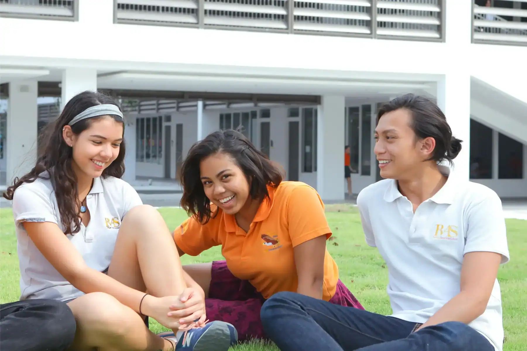 Students enjoying outdoor activities at Raffles American School.