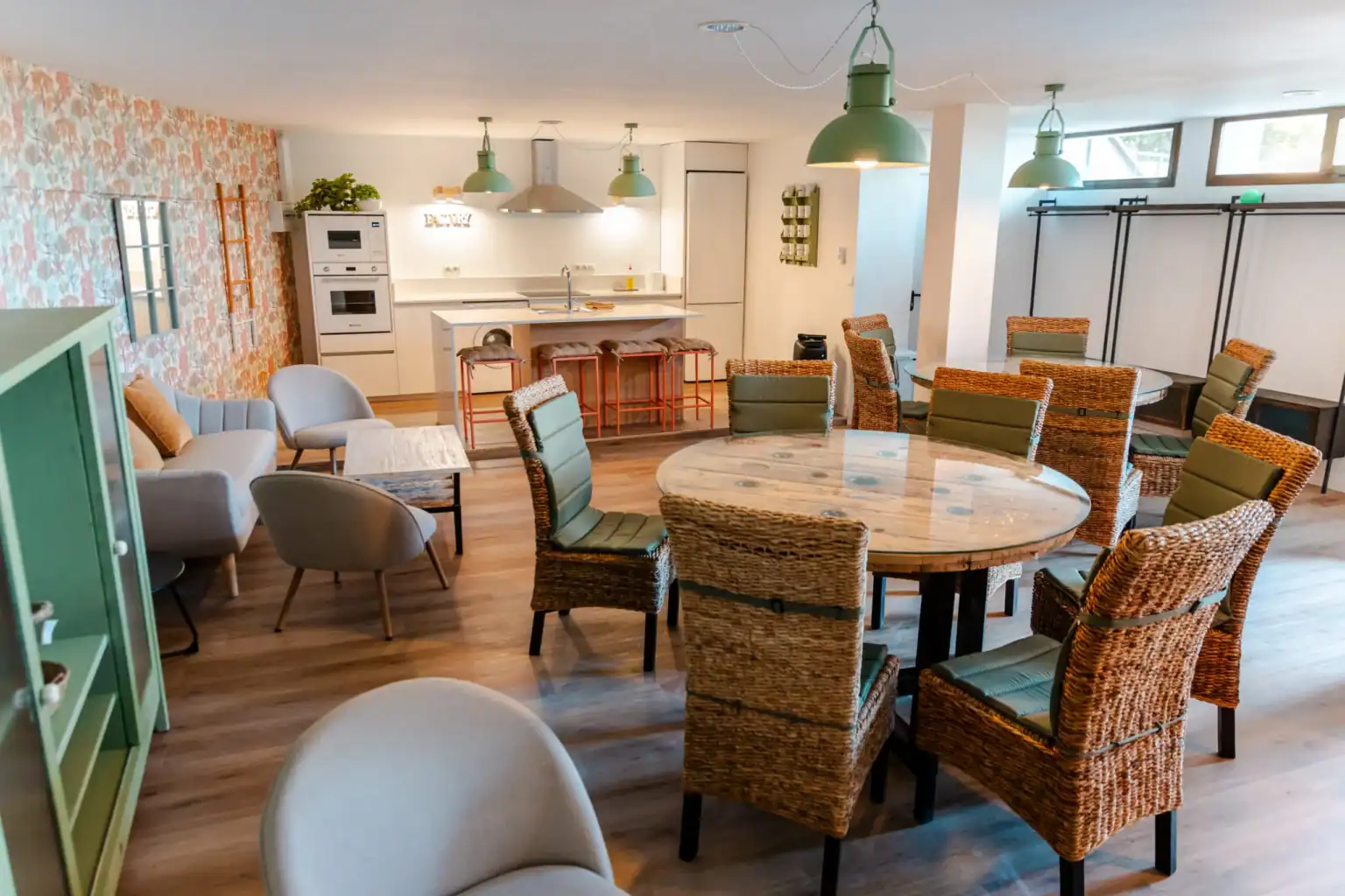 Cozy modern kitchen and dining area at a world schools facility, emphasizing comfortable learning and social spaces.