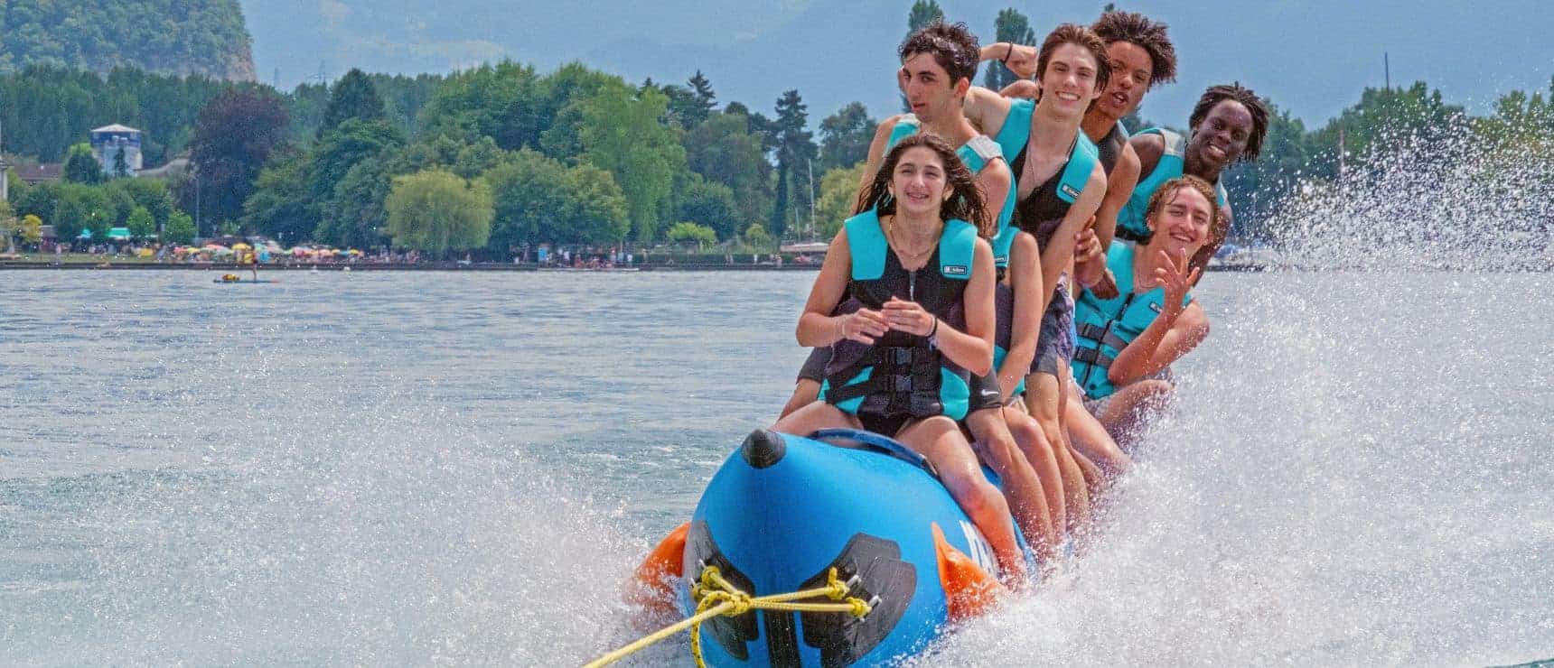 Adventure summer camp activities at world schools in scenic lakeside locations.