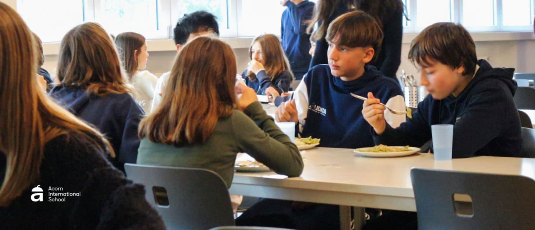 Italian Food Culture, a Heritage of Humanity: Educating Mediterranean Values at School 7 Children having lunch in a school cafeteria, fostering social interaction and healthy school environment.