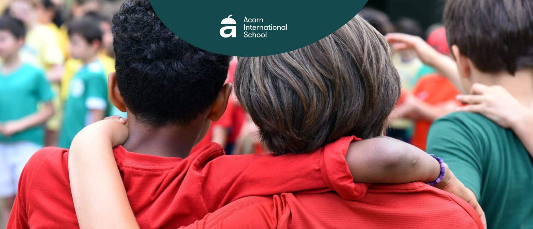 Changing Schools During the Academic Year: A Guide for Mobile Families 4 Group of diverse students hugging outdoors at World Schools event.