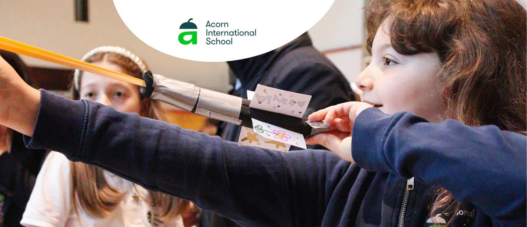 Children engaging in a science experiment at a world school.