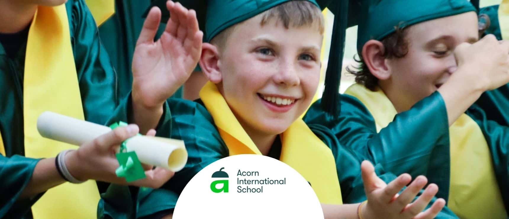 Happy students in caps and gowns celebrating graduation at World Schools.