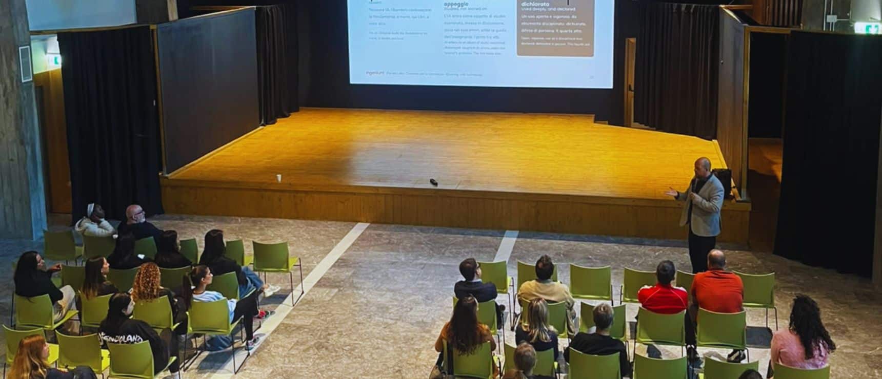 Audience attending a presentation at a World Schools event.