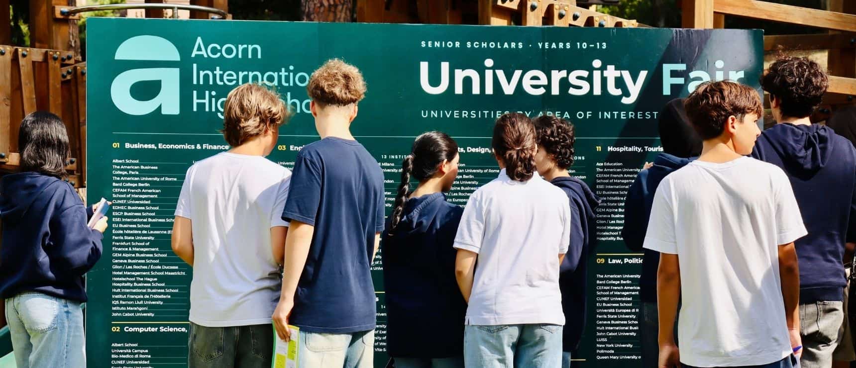 Students at the World Schools University Fair exploring higher education options.